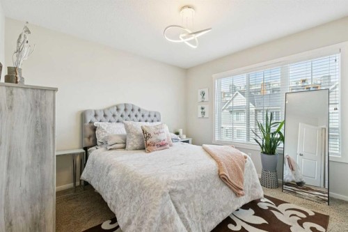 46 Kinlea Common Nw, Calgary, AB - Indoor Photo Showing Bedroom