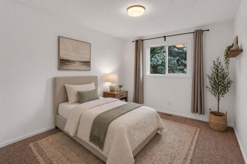 79 Scenic Way Nw, Calgary, AB - Indoor Photo Showing Bedroom