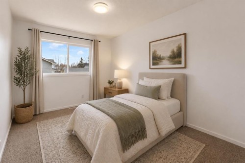 79 Scenic Way Nw, Calgary, AB - Indoor Photo Showing Bedroom