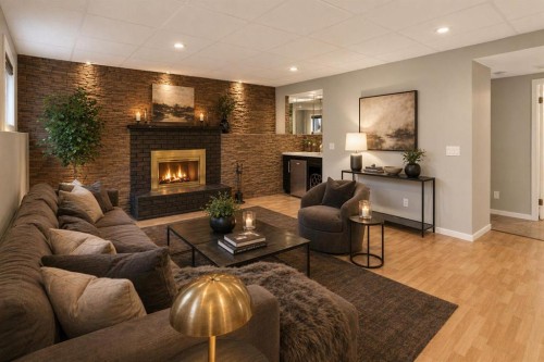 79 Scenic Way Nw, Calgary, AB - Indoor Photo Showing Living Room With Fireplace