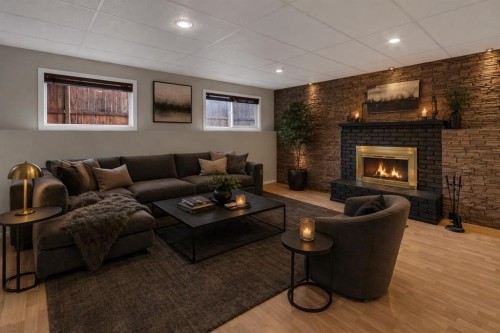 79 Scenic Way Nw, Calgary, AB - Indoor Photo Showing Living Room With Fireplace
