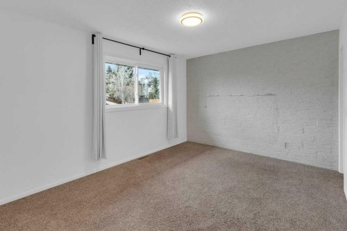 79 Scenic Way Nw, Calgary, AB - Indoor Photo Showing Other Room