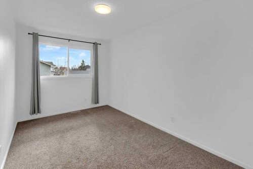 79 Scenic Way Nw, Calgary, AB - Indoor Photo Showing Other Room