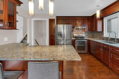79 Scenic Way Nw, Calgary, AB - Indoor Photo Showing Kitchen With Upgraded Kitchen