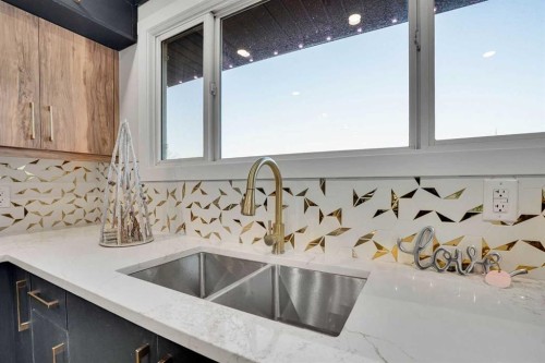 12112 Canfield Road Sw, Calgary, AB - Indoor Photo Showing Kitchen With Double Sink