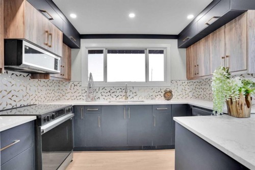 12112 Canfield Road Sw, Calgary, AB - Indoor Photo Showing Kitchen With Upgraded Kitchen