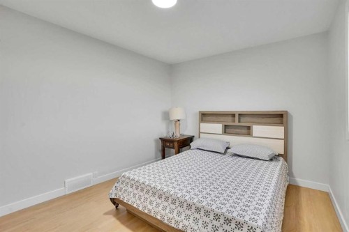 12112 Canfield Road Sw, Calgary, AB - Indoor Photo Showing Bedroom
