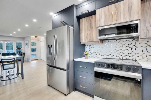 12112 Canfield Road Sw, Calgary, AB - Indoor Photo Showing Kitchen With Stainless Steel Kitchen With Upgraded Kitchen