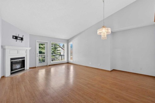 35 Douglasview Park Se, Calgary, AB - Indoor Photo Showing Other Room With Fireplace