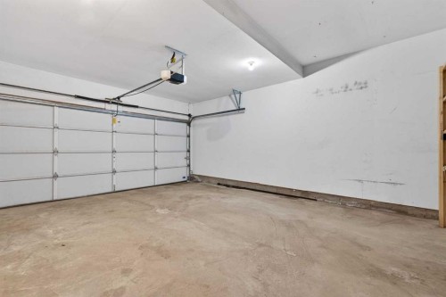 35 Douglasview Park Se, Calgary, AB - Indoor Photo Showing Garage