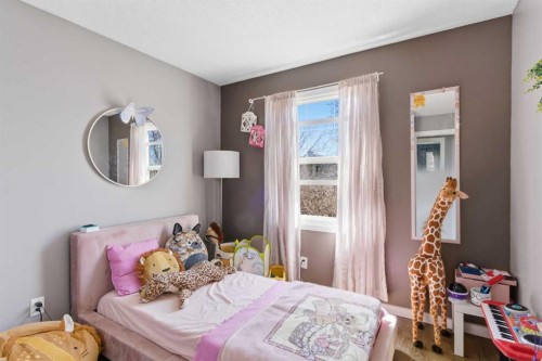 14767 Deer Ridge Drive Se, Calgary, AB - Indoor Photo Showing Bedroom