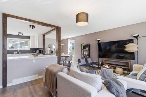 14767 Deer Ridge Drive Se, Calgary, AB - Indoor Photo Showing Living Room With Fireplace