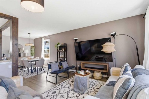 14767 Deer Ridge Drive Se, Calgary, AB - Indoor Photo Showing Living Room With Fireplace