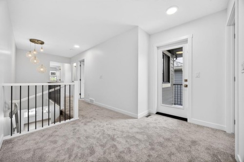 338 Alpine Boulevard Sw, Calgary, AB - Indoor Photo Showing Other Room