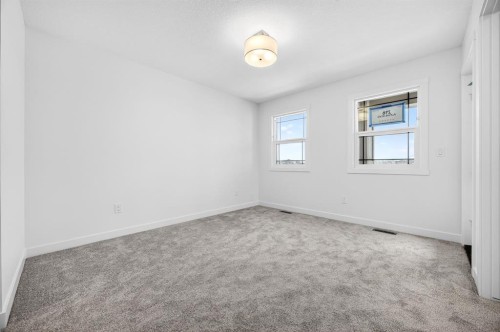 338 Alpine Boulevard Sw, Calgary, AB - Indoor Photo Showing Other Room