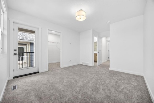 338 Alpine Boulevard Sw, Calgary, AB - Indoor Photo Showing Other Room