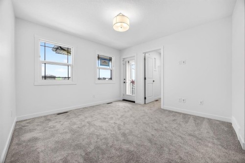 338 Alpine Boulevard Sw, Calgary, AB - Indoor Photo Showing Other Room