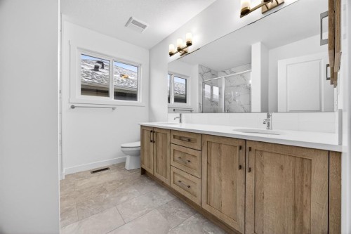 338 Alpine Boulevard Sw, Calgary, AB - Indoor Photo Showing Bathroom
