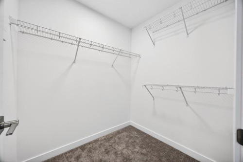338 Alpine Boulevard Sw, Calgary, AB - Indoor With Storage