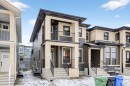 338 Alpine Boulevard Sw, Calgary, AB  - Outdoor With Balcony With Facade 