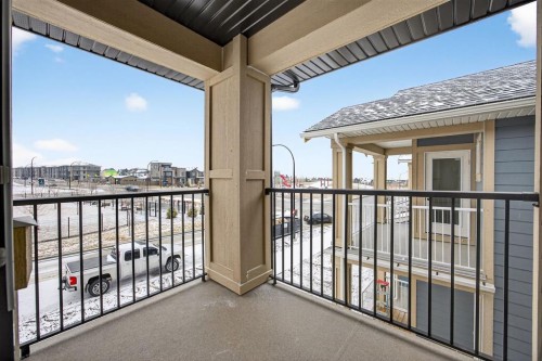 338 Alpine Boulevard Sw, Calgary, AB - Outdoor With Balcony With Exterior