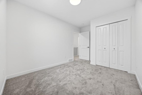 338 Alpine Boulevard Sw, Calgary, AB - Indoor Photo Showing Other Room