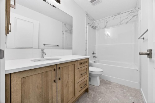 338 Alpine Boulevard Sw, Calgary, AB - Indoor Photo Showing Bathroom