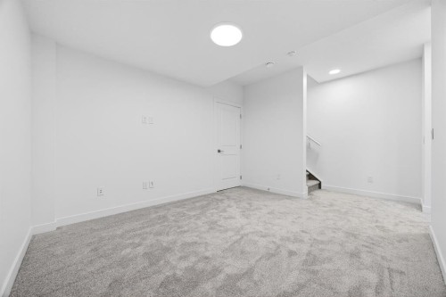 338 Alpine Boulevard Sw, Calgary, AB - Indoor Photo Showing Other Room