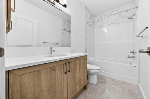 338 Alpine Boulevard Sw, Calgary, AB - Indoor Photo Showing Bathroom