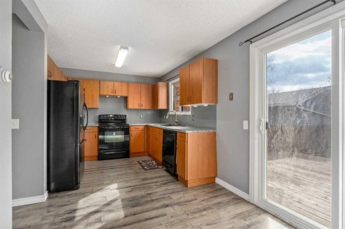 19 Bernard Drive Nw, Calgary, AB - Indoor Photo Showing Kitchen