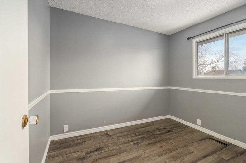 19 Bernard Drive Nw, Calgary, AB - Indoor Photo Showing Other Room