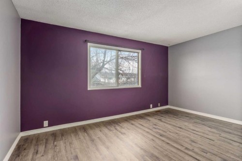 19 Bernard Drive Nw, Calgary, AB - Indoor Photo Showing Other Room