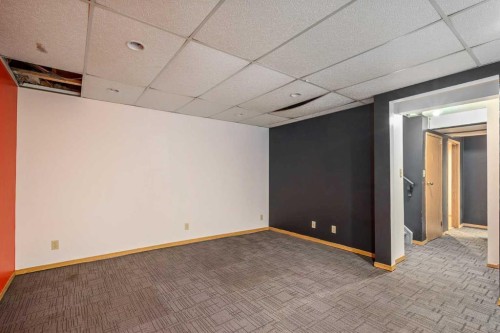 19 Bernard Drive Nw, Calgary, AB - Indoor Photo Showing Other Room