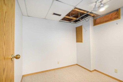 19 Bernard Drive Nw, Calgary, AB - Indoor Photo Showing Other Room