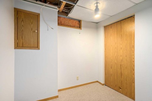 19 Bernard Drive Nw, Calgary, AB - Indoor Photo Showing Other Room