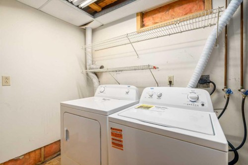 19 Bernard Drive Nw, Calgary, AB - Indoor Photo Showing Laundry Room