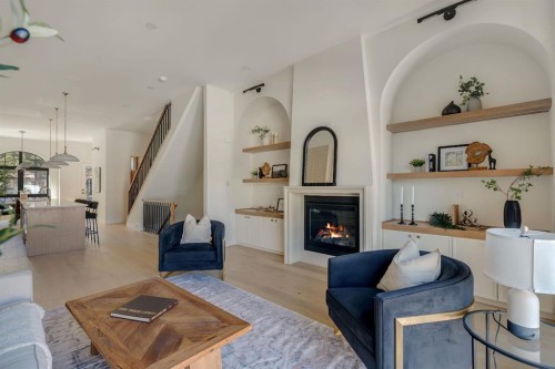 512 29 Avenue Nw, Calgary, AB - Indoor Photo Showing Living Room With Fireplace
