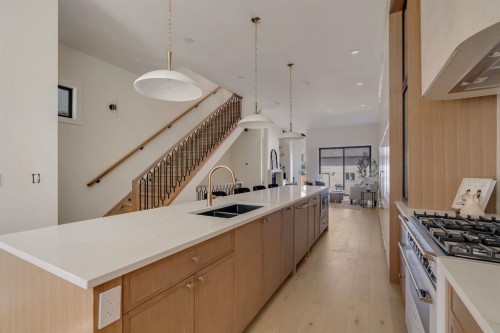 512 29 Avenue Nw, Calgary, AB - Indoor Photo Showing Kitchen With Double Sink
