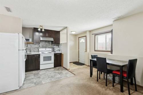 156 Falshire Close Ne, Calgary, AB - Indoor Photo Showing Kitchen