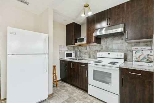 156 Falshire Close Ne, Calgary, AB - Indoor Photo Showing Kitchen