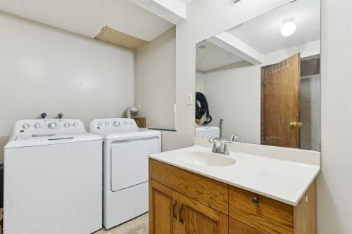 156 Falshire Close Ne, Calgary, AB - Indoor Photo Showing Laundry Room