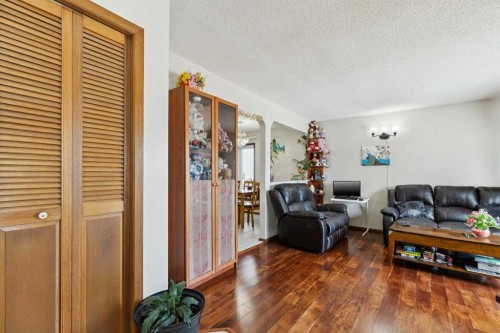 156 Falshire Close Ne, Calgary, AB - Indoor Photo Showing Living Room
