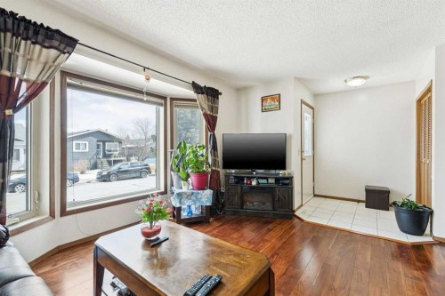 156 Falshire Close Ne, Calgary, AB - Indoor Photo Showing Living Room