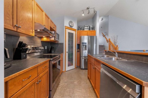 46 Cranberry Green Se, Calgary, AB - Indoor Photo Showing Kitchen With Double Sink