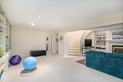 28 Hamptons Rise Nw, Calgary, AB - Indoor With Fireplace