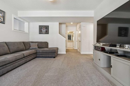 55 Sundown Crescent, Cochrane, AB - Indoor Photo Showing Living Room