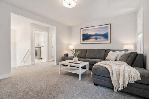 55 Sundown Crescent, Cochrane, AB - Indoor Photo Showing Living Room