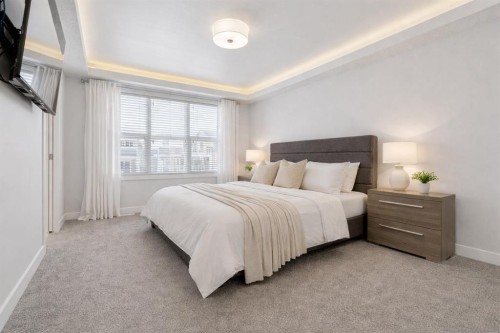 55 Sundown Crescent, Cochrane, AB - Indoor Photo Showing Bedroom
