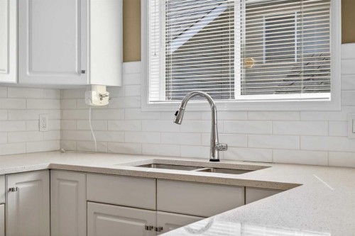 711 Diamond Court Se, Calgary, AB - Indoor Photo Showing Kitchen With Double Sink