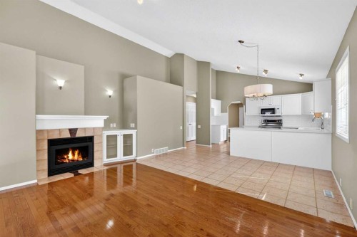 711 Diamond Court Se, Calgary, AB - Indoor With Fireplace